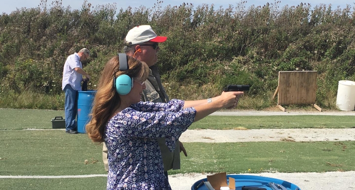 Theresa Gavarone firing a handgun at a gun range